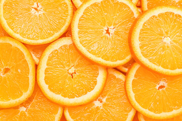 Slices of juicy orange as background, closeup