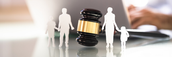 Separation Of Family Silhouette With Gavel