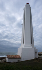 Les Sables d'Olonne, France - March 1, 2022:  The lighthouse of the Armandeche was built in 1968 and is the last large lighthouse to have been built in France. Atlantic coast. Selective focus.