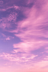 Dramatic beautiful sunrise, sunset pink violet blue sky with cirrus clouds background texture	
