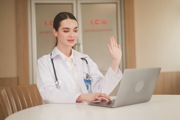 Woman caucasian doctor using computer for online health consult