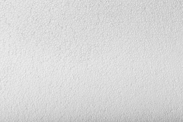 Abstract close up texture photo of compressed white styrofoam background..