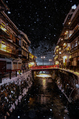 Fototapeta na wymiar Ginzan Onsen in Winter Snow Fall, Yamagata, Japan 