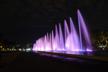 Night scene of waterfalls in the pools of the magic water circuit in Lima; recreational park popular for the colorful colors of its waters.