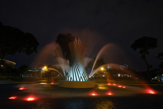 Night scene of waterfalls in the pools of the magic water circuit in Lima; recreational park popular for the colorful colors of its waters.