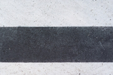 Fototapeta premium painted white and black lines on the ground