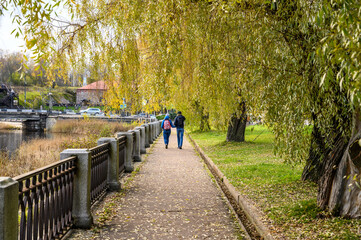 Autumn day. walk through the autumn city. walk in the park. walk along the embankment