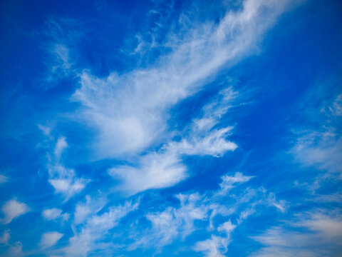Wispy Clouds on a Blue Sky