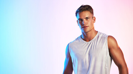 Im always up for a challenge. Studio portrait of a handsome young male athlete posing against a...