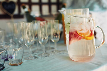 The type of drink that will refresh you. Shot of beverages on a table at a tea party inside.