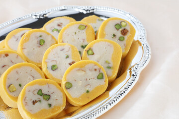 Indian Sweet Food Badam Barfi Also Know As Mithai, barfee, Mawa Barfi, Mava barfi, Almond Sweet, khoya Burfi Indian Popular Sweet Made up of  Mawa, Milk and Sugar 