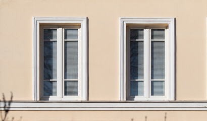 Fototapeta na wymiar window in the wall of the house background texture