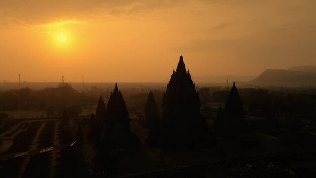 Aerial Shot of Candi Prambanan, and beautiful Sunrise in Yogyakarta, Central Java, Indonesia