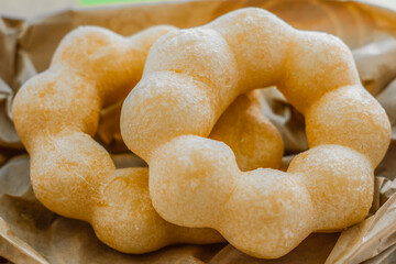 Bread Ring two pieces are placed on the paper bag Brown