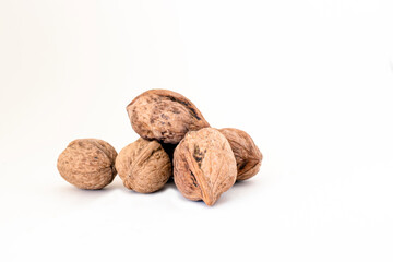 Shelled walnuts isolated on a white background.
