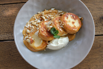 Breakfast food menu salads granola waffles cheese and tea