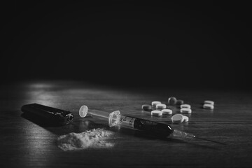 Stop drug addiction concept International Day against Drug syringe and cooked heroin on spoon.