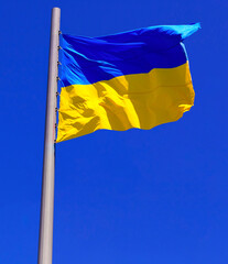 flag of Ukraine against bright blue sky