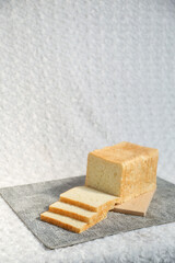 Plain toasted bread whole. White bread toast slice.