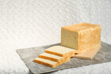 Plain toasted bread whole. White bread toast slice.