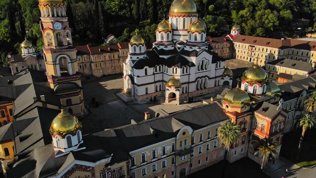 Beautiful Orthodox New Athos Monastery with golden domes in the New Athos