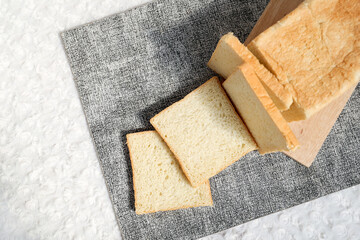 Plain toasted bread whole. White bread toast slice.