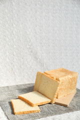 Plain toasted bread whole. White bread toast slice.