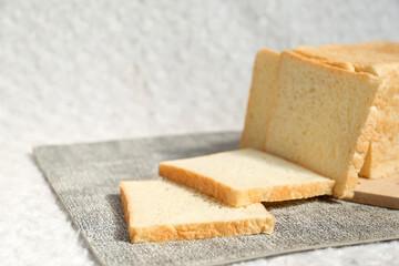 Plain toasted bread whole. White bread toast slice.