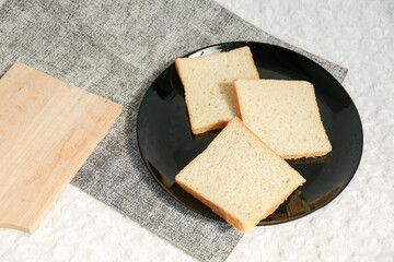 Plain toasted bread whole. White bread toast slice.