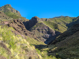 Barranco de El Risco en la isla de Gran Canaria, España. Debajo de esa pared se conoce como el charco azul. El Risco es un pequeño pueblo al oeste de la isla.
