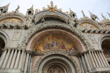 beautiful mosaic made with gold and colored tiles in the Basilica of San Marco in Venice
