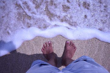 feet on the beach