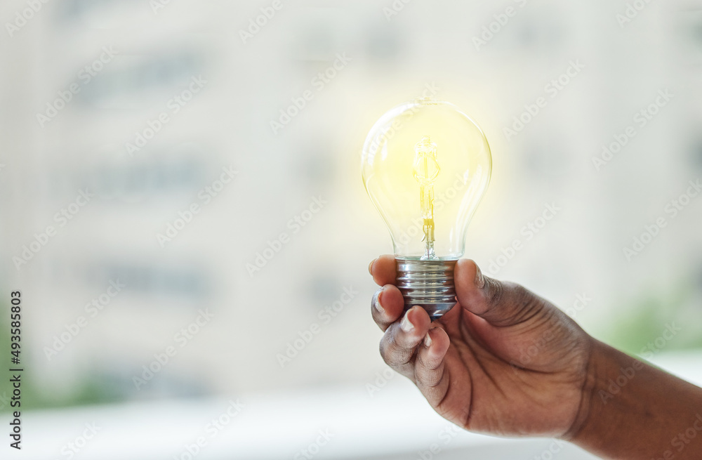 Poster whats achieved today was once just an idea. shot of an unrecognisable businesswoman holding a lightb
