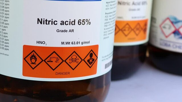 Nitric acid in glass, chemical in the laboratory and industry