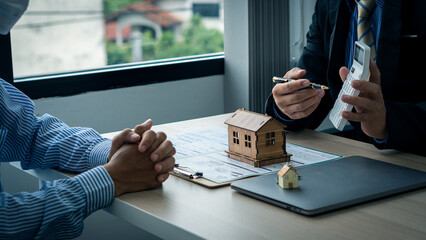 Sales agents offer interest rate contracts on home installments and home purchases for clients to...