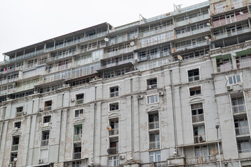 Fototapeta na wymiar Residential building in Georgia Batumi. slums with balconies. high-rise building