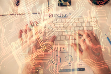 Double exposure of man's hands typing over computer keyboard and tech theme hologram drawing. Top view. Technology concept.