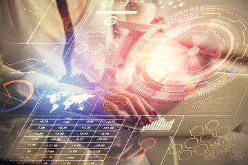 Multi exposure of woman hands working on computer and data theme hologram drawing. Tech concept.