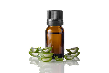 Bottle of Aloe Vera essential oil with cut slice aloe vera leaves isolated on white background. Natural organic product. Skin care and health concept.