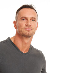 Obraz premium Im the strong and silent type. Handsome mature man isolated on white - head and shoulders portrait.