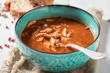Spicy and aromatic tripe soup as traditional soup in Poland.