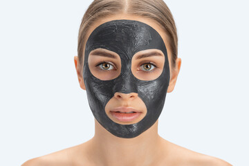 Beautician does Carbon peeling procedure to a beautiful woman. Hardware cosmetology treatment in...