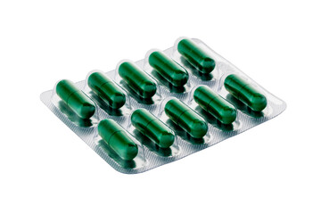 Silver packaging of green color tablets isolated on white background