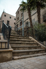 Fototapeta na wymiar Calle con escaleras en la iglesia de Sant Miquel d'Artesa de Lleida