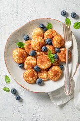 Tasty poffertjes as a classic Danish breakfast