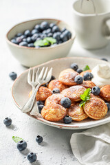 Delicious and homemade mini pancakes for fresh breakfast.