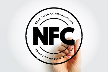 NFC - Near Field Communication acronym, technology concept background