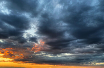 Beautiful sunset sky with a low clouds