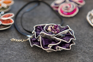 Simple women's jewelry. A scattering of jewelry for a woman on the table.