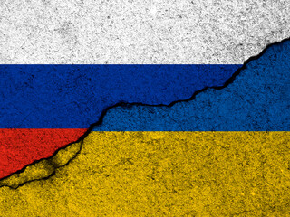 Russia and Ukraine flags. War crisis, political conflict. Cracked concrete wall background